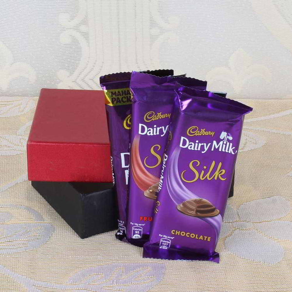 Latest Artificial Red Golden Rose& Dairy Milk Silk Fruit And Nut Chocolate  | Up to 60% Off