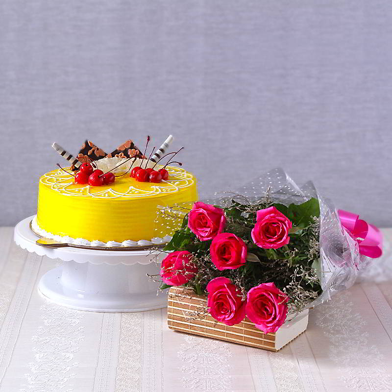 Send a simple 12 Red Rose with a delicious Chocolate Cake with a Red Heart  (500gm) - Free & On-Time Delivery | Bangalore